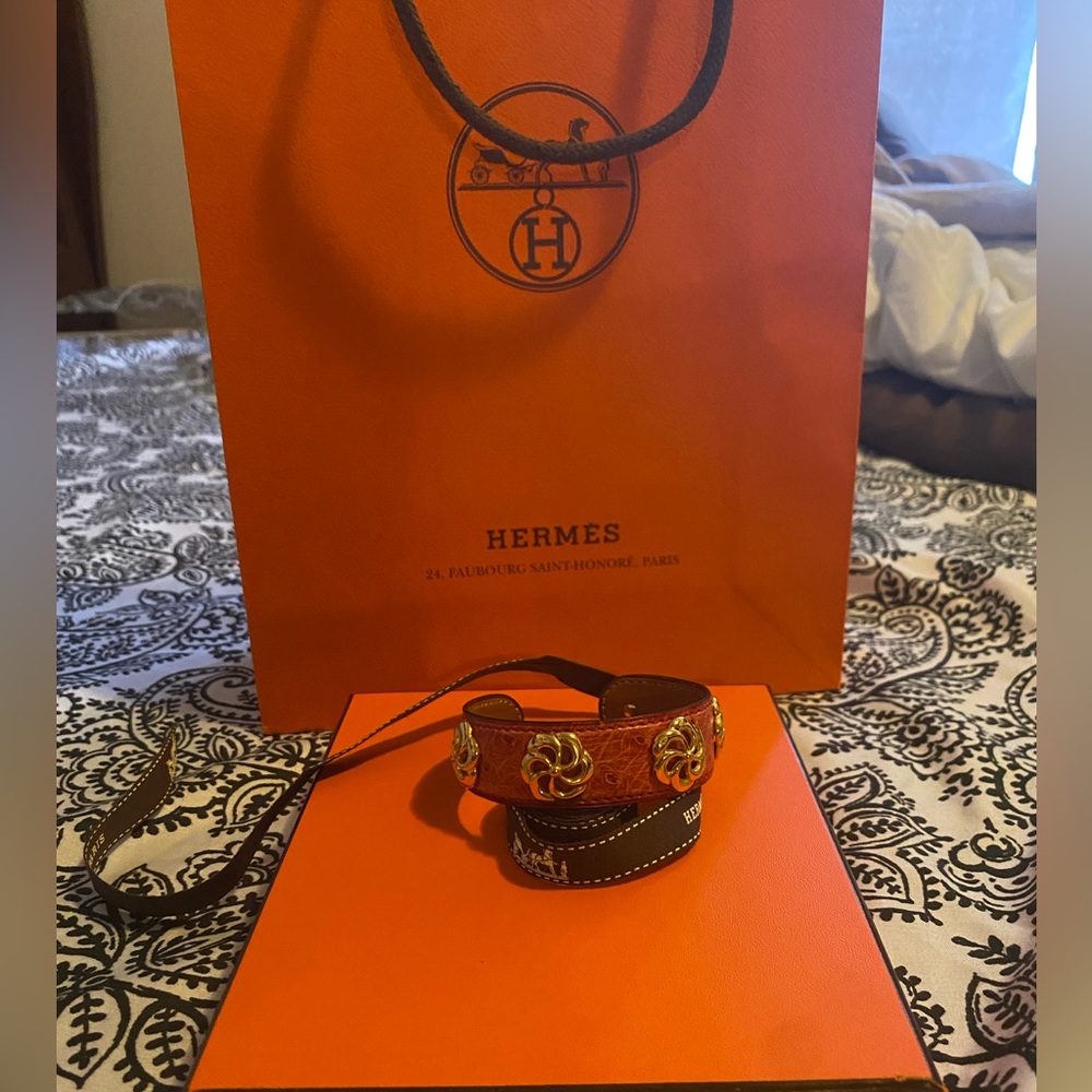 Vintage Hermes bracelet in ostrich red with gold swirls ****Price Firm***
